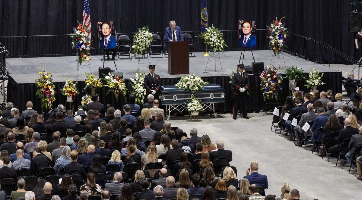Rep. Bruce Skaug, R-Nampa reads the obituary Rick Hogaboam during a memorial honoring Nampa's mayor at Ford Idaho Center, in Nampa, Tuesday, March 31, 2026.