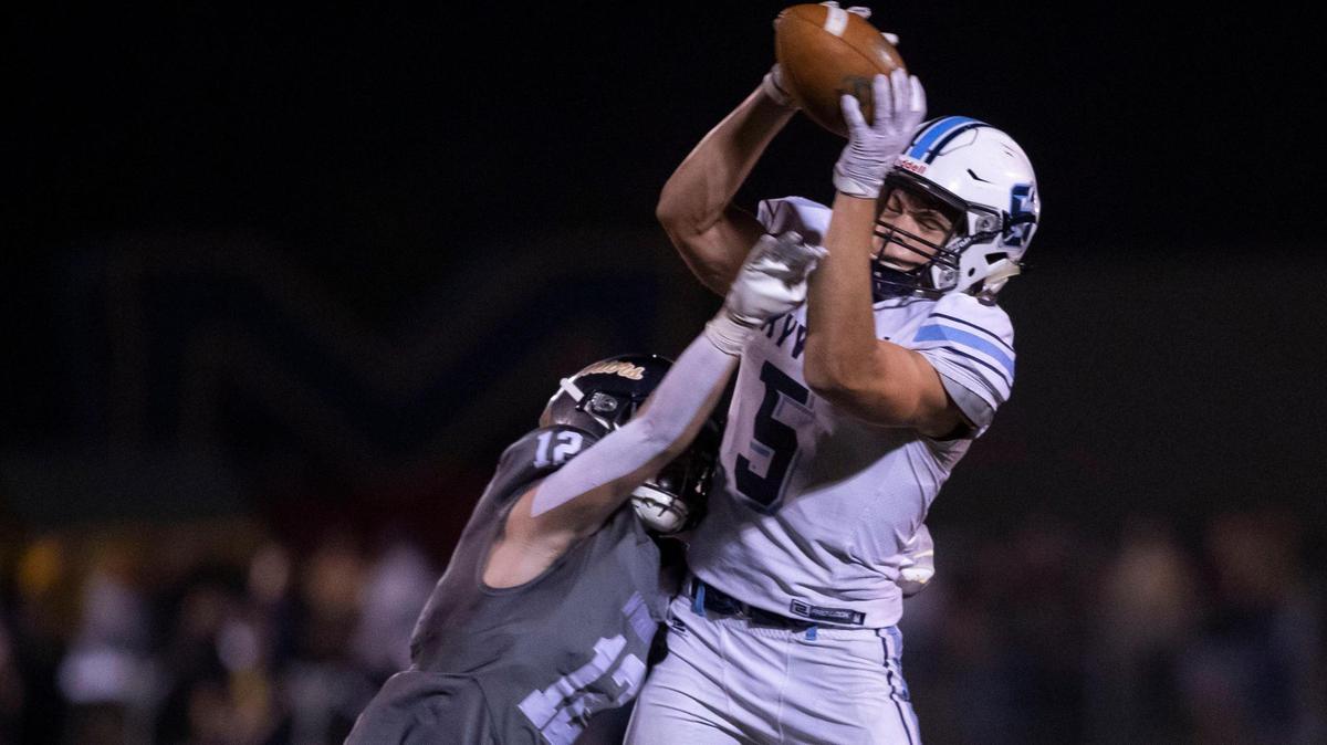 Skyview wide receiver TerRyek Pennington grabs a first-down catch on Oct. 1. The Hawks travel to Pocatello’s Holt Arena to face Highland in the first round of the 5A state playoffs.