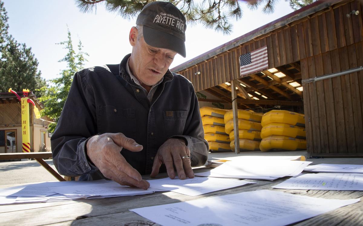 John “JB” Lawler sorts through stacks of legal documents that he thought would protect him and his wife, Georgianna, in a business transaction that went sour in 2015. The Lawlers had planned to sell Idaho Whitewater Unlimited Inc. and start a new chapter in their lives, they said, but the deal they made with Keith “Craig” Fletcher fell apart and left them with tax liens, a black mark on their license and thousands of dollars in expenses.