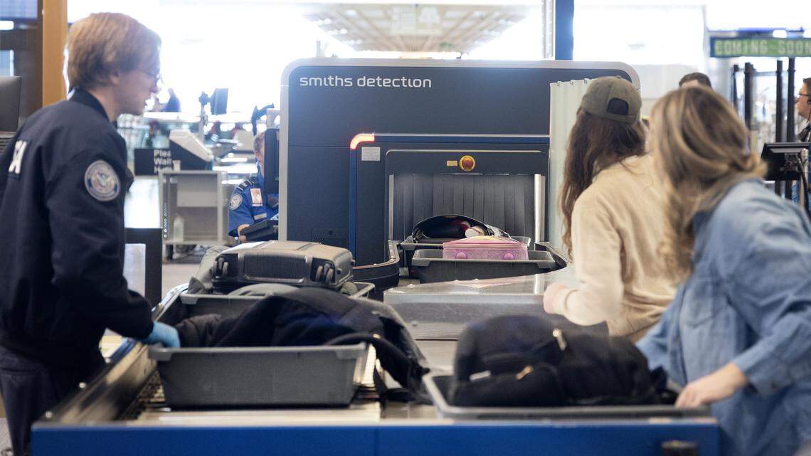 People go through TSA screening at the Boise Airport, Dec. 16, 2025.