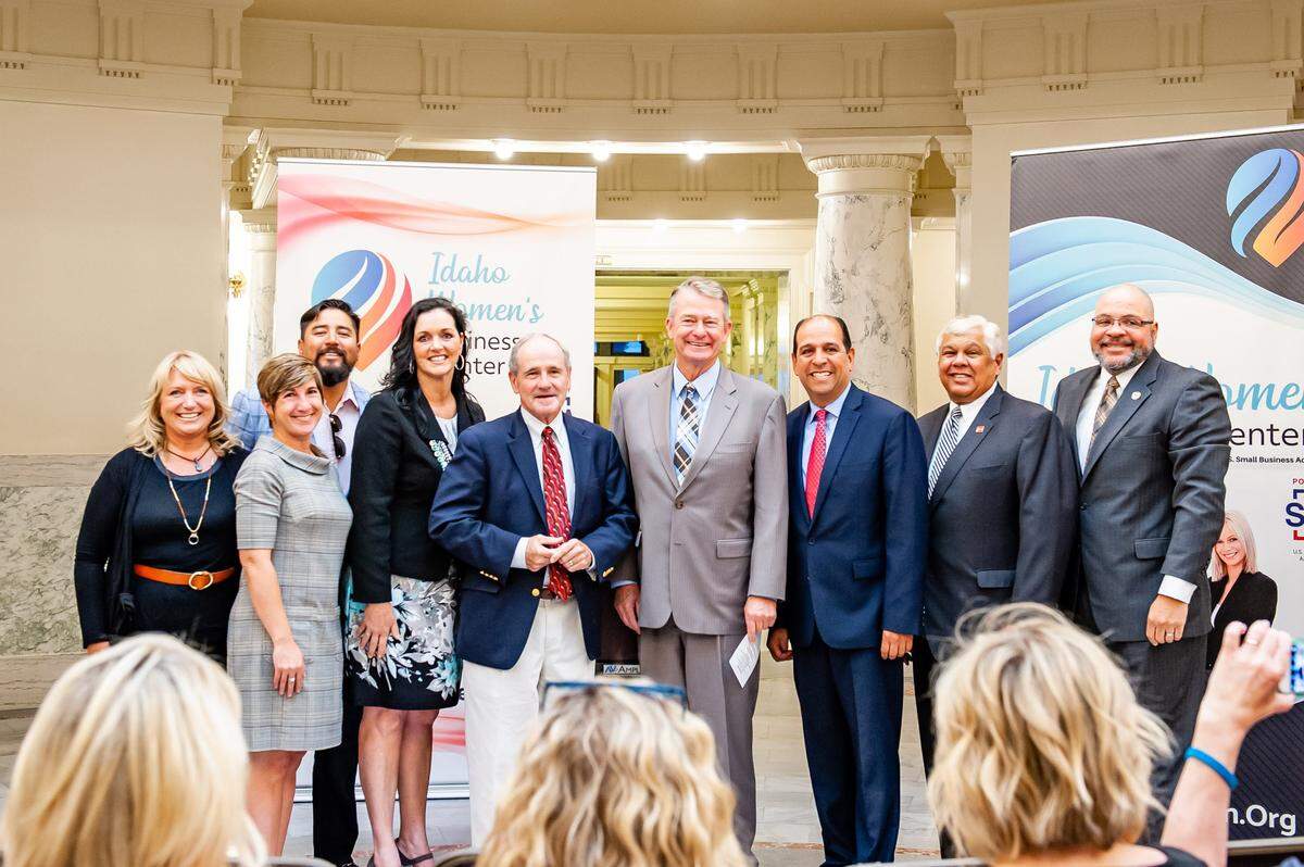 Guests and speakers at a ribbon-cutting ceremony July 19, 2019, at the Capitol for the new Idaho Women’s Business Center. From left: Amy Lientz, Idaho National Laboratory, education partnerships director; Jessica Flynn, National Women’s Business Council board member; Ivan Castillo, Idaho Hispanic Foundation president; Diane Beven, Idaho Women’s Business Center executive director; U.S. Sen. James Risch; Gov. Brad Little; Allen Gutierrez, U.S. Small Business Administration Office of Entrepreneurial Development associate administrator; Don Melendez, Wells Fargo Idaho regional president; and Mike Satz, University of Idaho associate vice president.