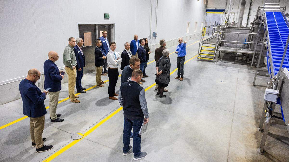 Dignitaries and local leaders tour a new Mart Frozen Foods potato processing plant just south of Interstate 84 in Rupert after a ribbon-cutting ceremony Oct. 2.