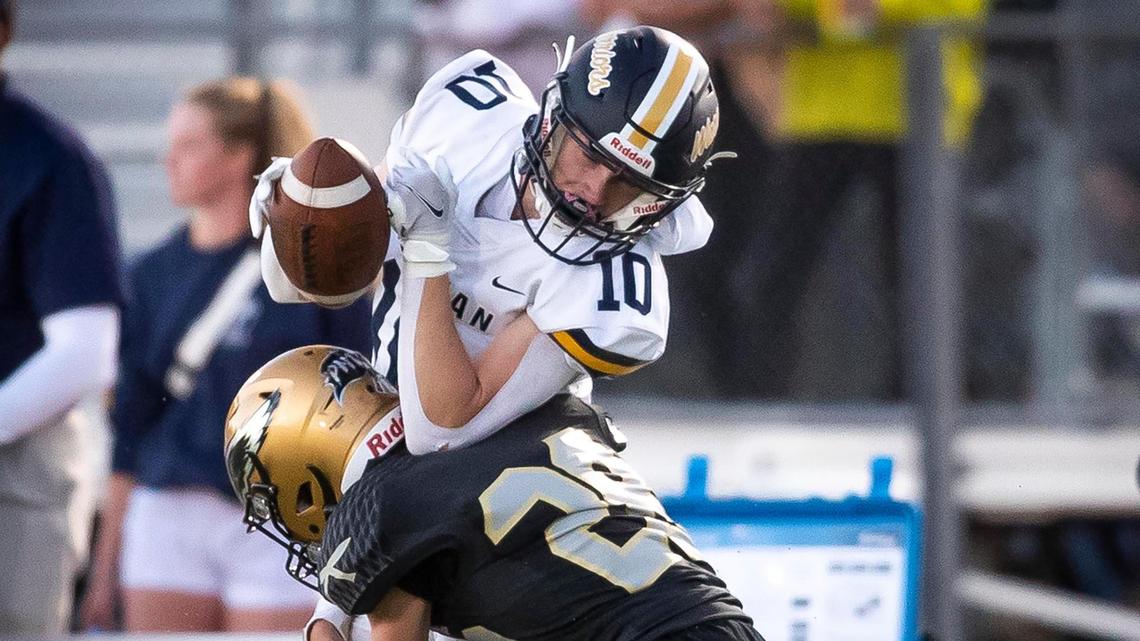Meridian wide receiver Quentin Riley absorbs a hit from Capital’s Brody Call but hangs onto the pass for a first-down reception Sept. 16 at Dona Larsen Park in Boise. Meridian will try to snap a 14-game losing streak to Eagle on Friday.