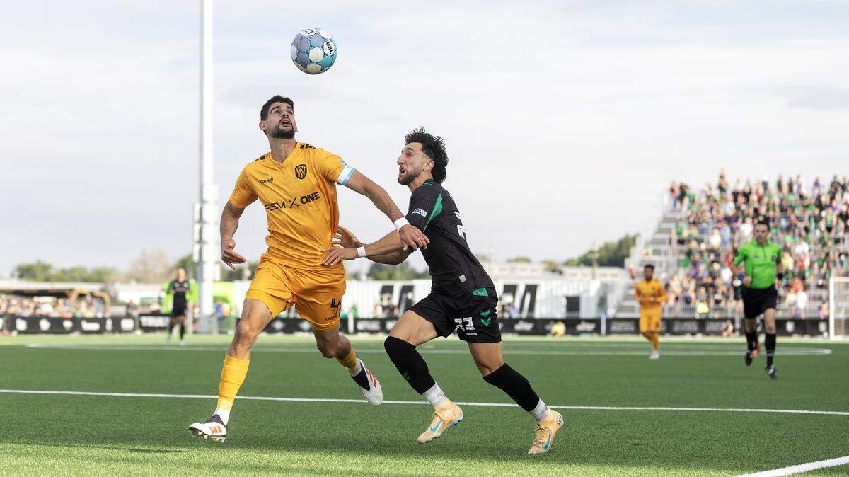 Fort Wayne FC defender Tiago Dias, left, and AC Boise forward Omar Yehya, right, chase the header in the first half of their soccer match, Saturday, May 23, 2026, at Athletic Club Boise Stadium.