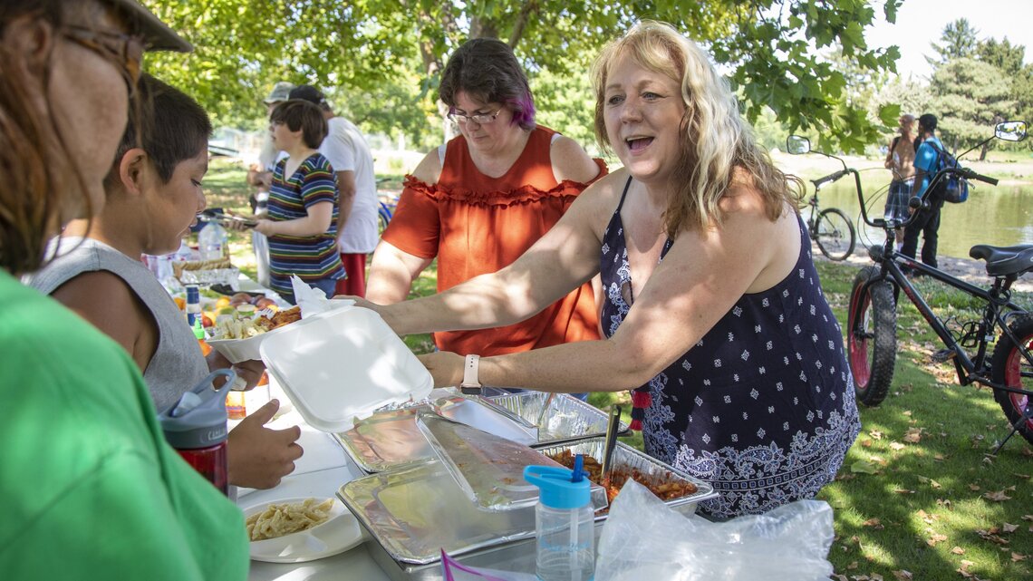 Feeding our Friends: Free dinners in the park for the hungry, with servings of love