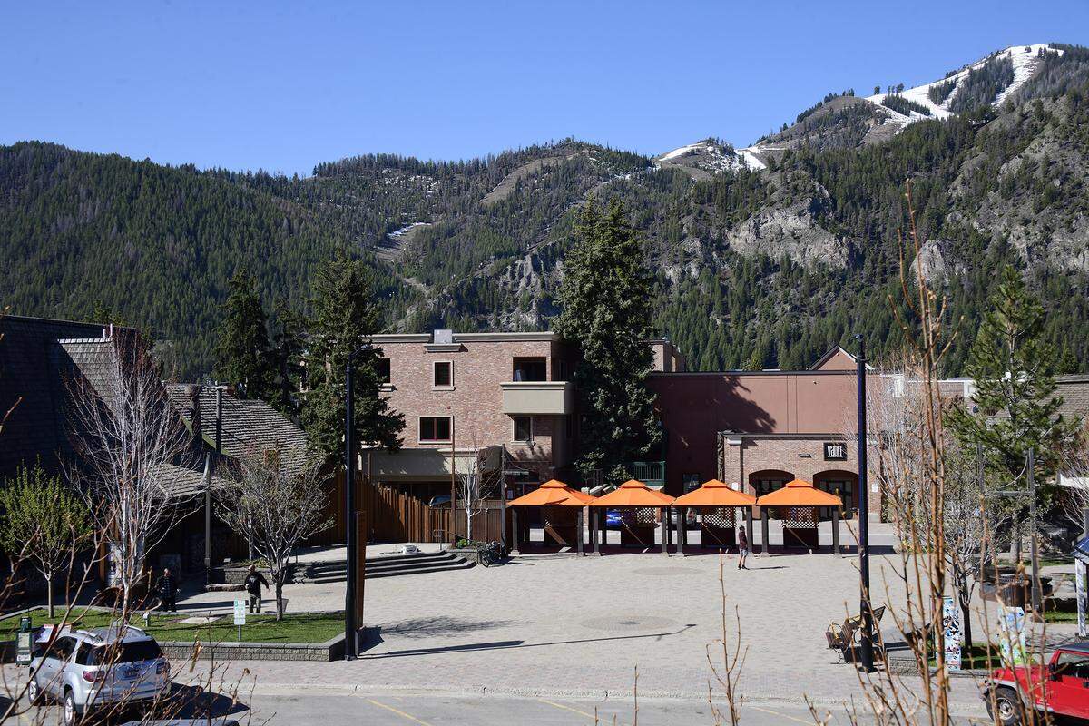 Ketchum Town Square sits empty on Friday, May 8, 2020, with Sun Valley Ski Area’s Bald Mountain in the background. Normally there are tables, chairs and umbrellas on the square this time of year, but Blaine County is still recovering after being hit hard by a coronavirus outbreak in March.