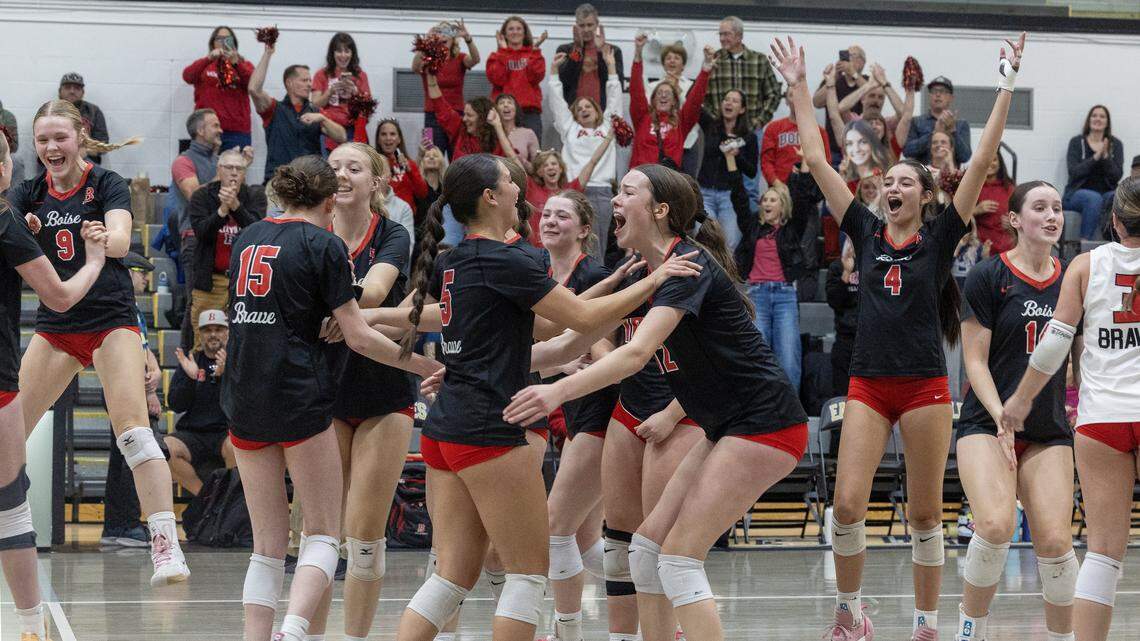 Boise players celebrate after winning a set in their match against Skyview in the state volleyball tournament, held at Capital High School, Thursday, Oct. 30, 2025.