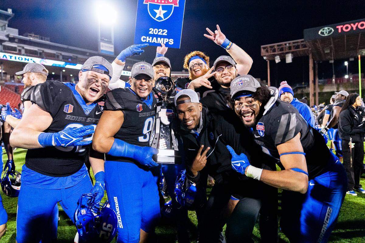 Boise State’s Jabril Frazier celebrates with a group of defensive linemen after the Broncos' 35-32 win over North Texas in the 2022 Frisco Bowl. Frazier played at Boise State from 2015 to 2018, and then was hired as a full-time coach in 2023 after serving as a graduate assistant.