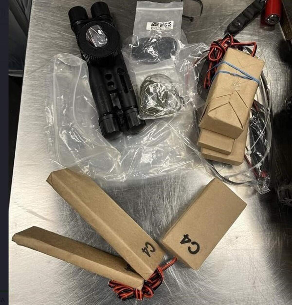 A training replica of a bomb made up of PVC pipes and blocks marked as ‘C4’