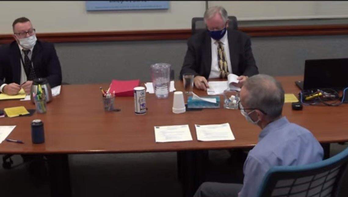 Dr. Sky Blue, front, speaks to Ada County Commissioners Ryan Davidson, left, and Rod Beck. The commission considered Blue for an open seat on the Central District Health board but reappointed former Congressman Raúl Labrador instead.