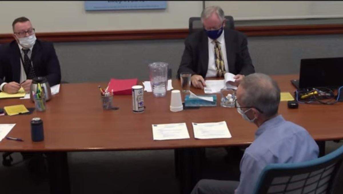 Dr. Sky Blue, front, speaks to Ada County Commissioners Ryan Davidson, left, and Rod Beck. The commission considered Blue for an open seat on the Central District Health board but reappointed former Congressman Raúl Labrador instead.