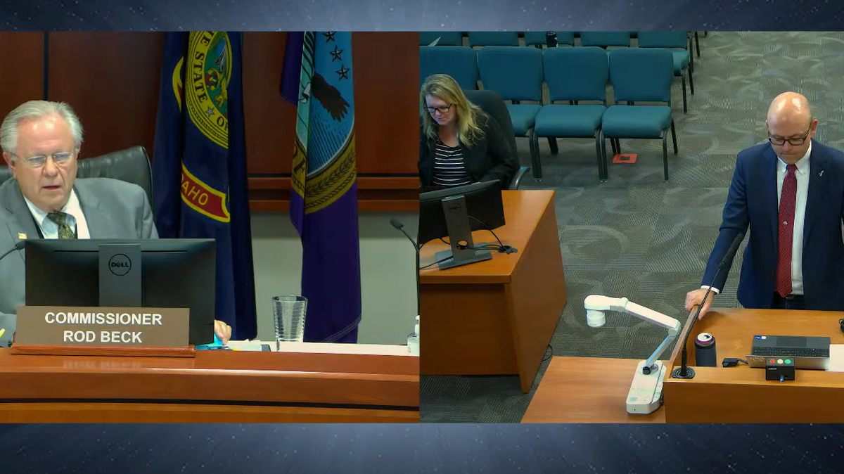 Commissioner Rod Beck and Ada County Clerk Phil McGrane discuss the county budget last week.