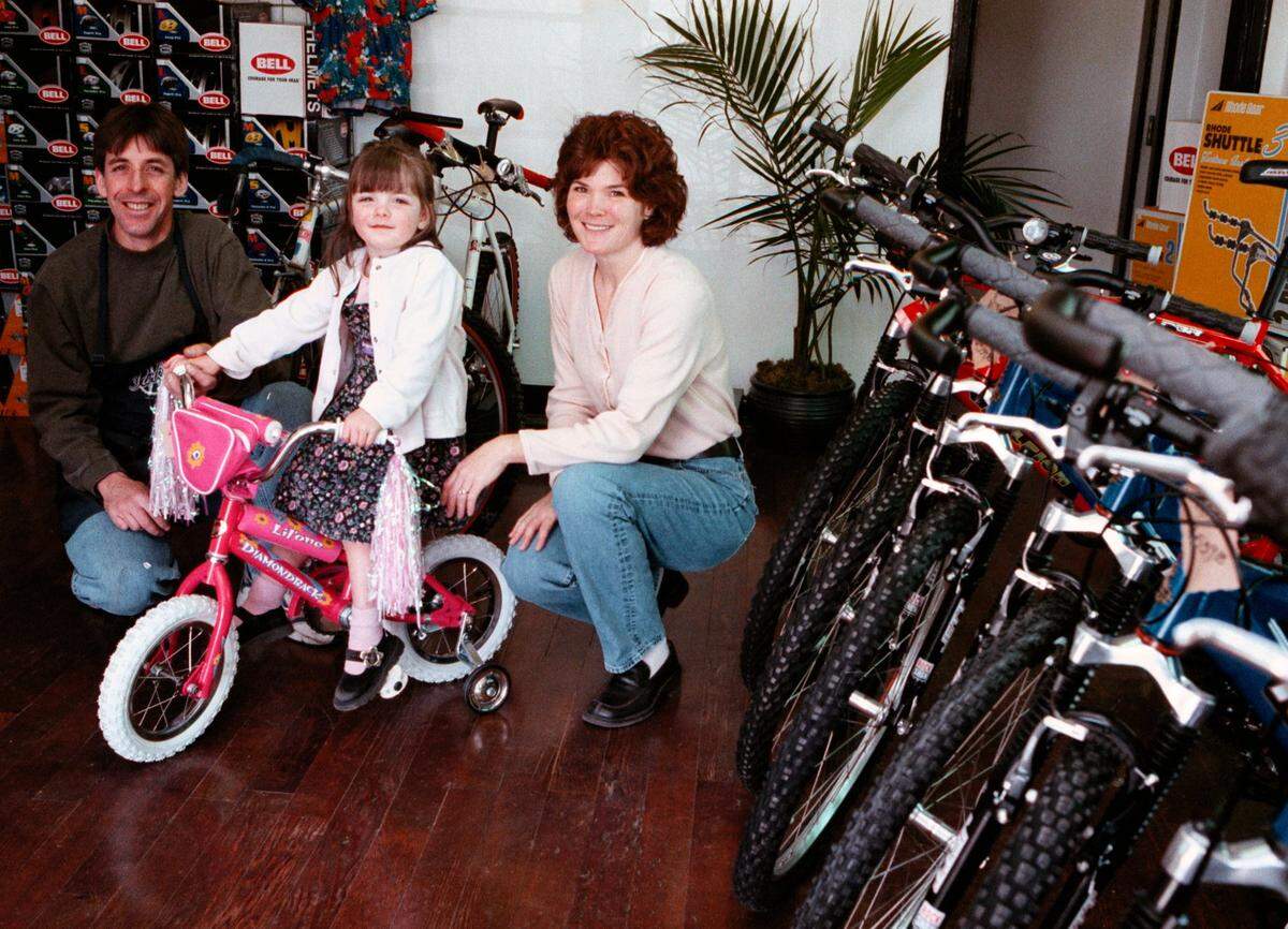 \b\Kim Hughes \b0\/ The Idaho Statesman: \b\Bill and Tami Reed, \b0\shown with their youngest daughter, Catie, 3, just opened a new cycle shop in Eagle called Reed Cyclery.
