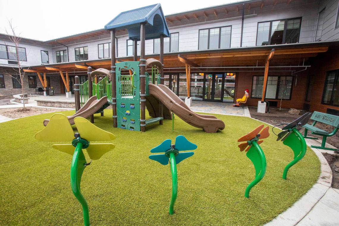 The Ronald McDonald House is moving from the historic home where it had been for 32 years, across a driveway to a newly built, larger home that can serve 47 families.