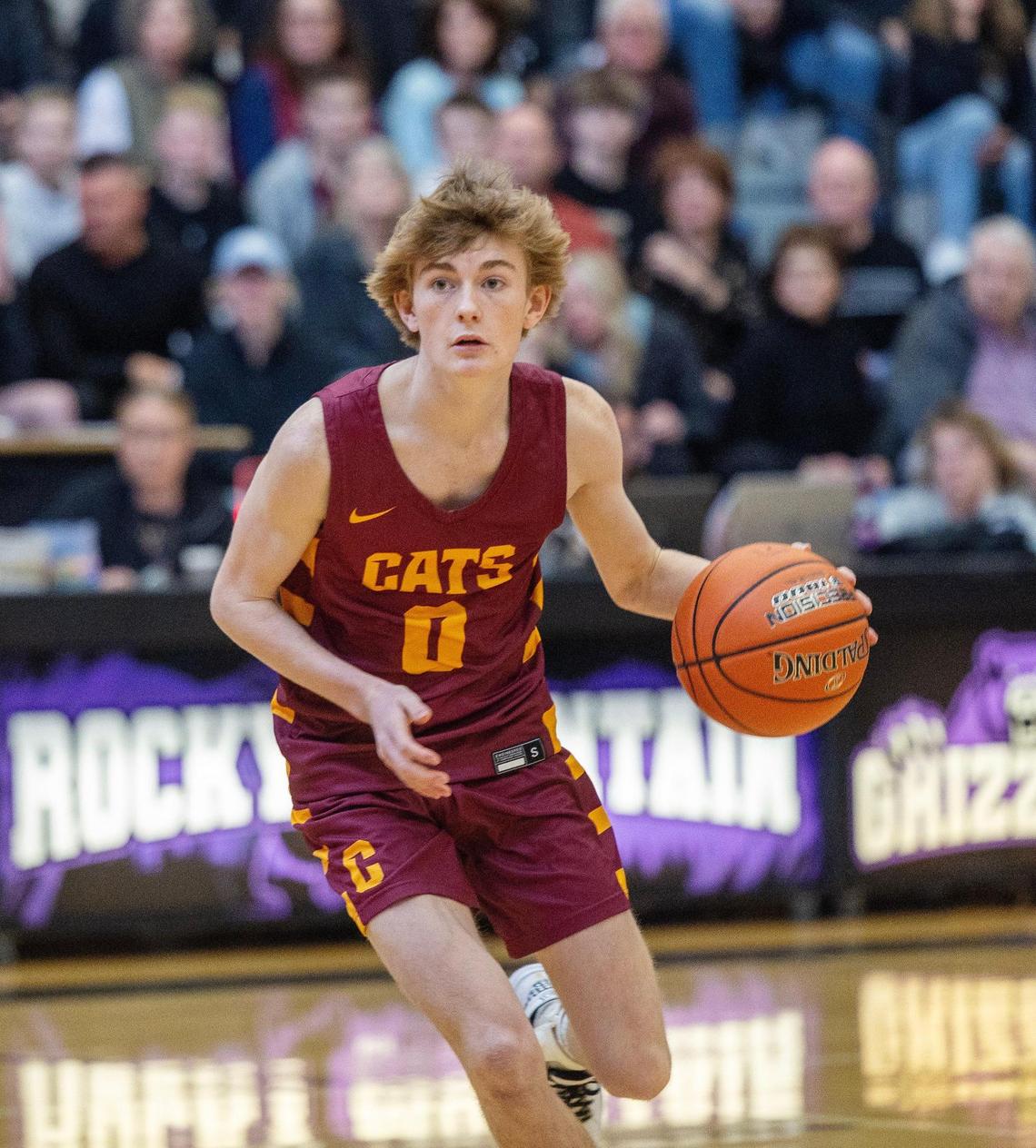 Columbia sophomore Tavin Jones dribbles the ball during their game against Hillcrest in the first round of the 5A boys basketball state tournament Thursday at Rocky Mountain High School in Meridian.