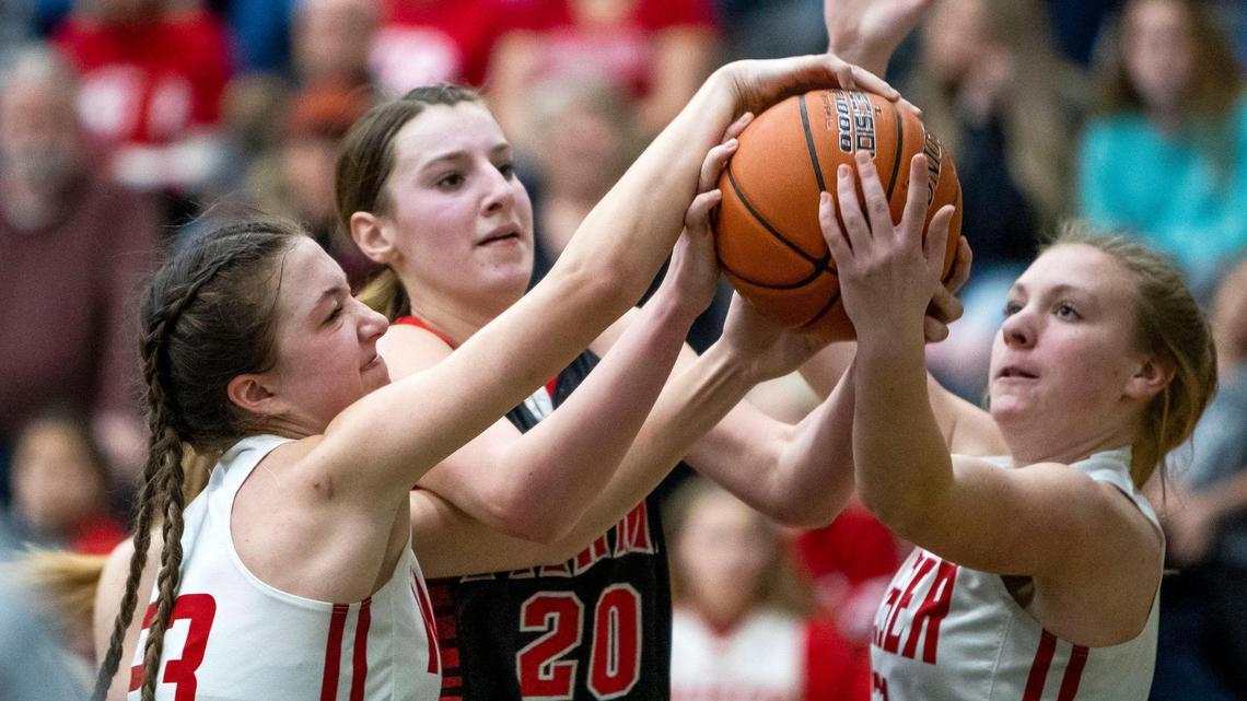 Parma’s Kaidance Kaiser, center, fights for a rebound during last year’s 3A state tournament. Kaiser and the Panthers climbed to the top of the 3A rankings in the latest girls basketball state media poll released Tuesday.