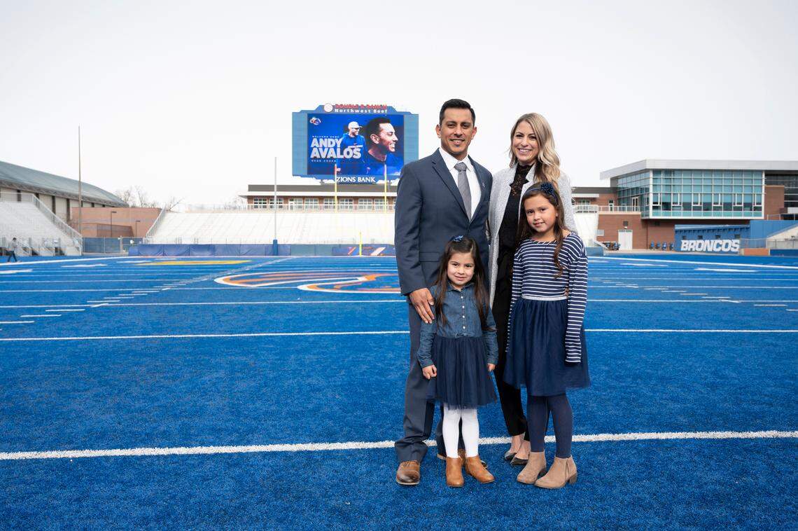 Boise State football coach Andy Avalos signed a five-year contract worth about $1.4 million a year to return to his alma mater as head coach. He’s joined in Boise by wife Summer and daughters Paityn, right, and Paige.