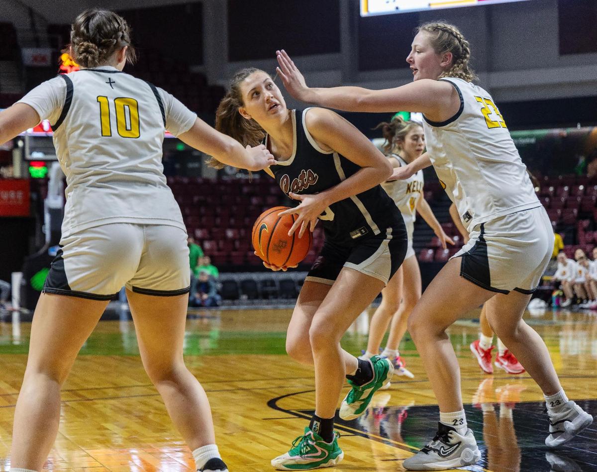 Columbia’s Addy Bayne controls the ball during the 4A District Three Tournament championship game against Bishop Kelly at Idaho Central Arena last season.