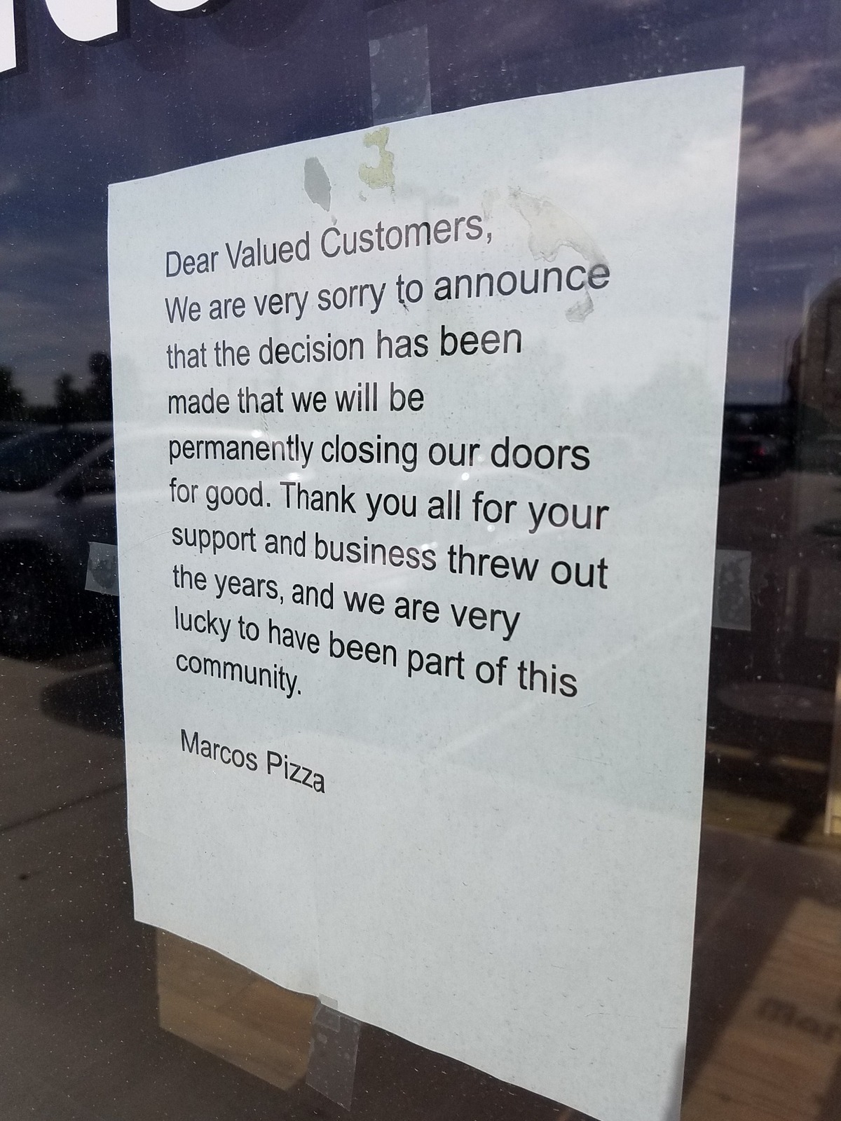 A message on the door at Marco’s Pizza says that it has permanently closed.