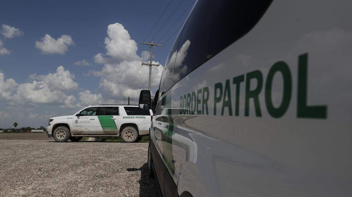 Border patrol vehicles near the Rio Grande, where officers patrol for people crossing into the U.S. from Mexico early this week.