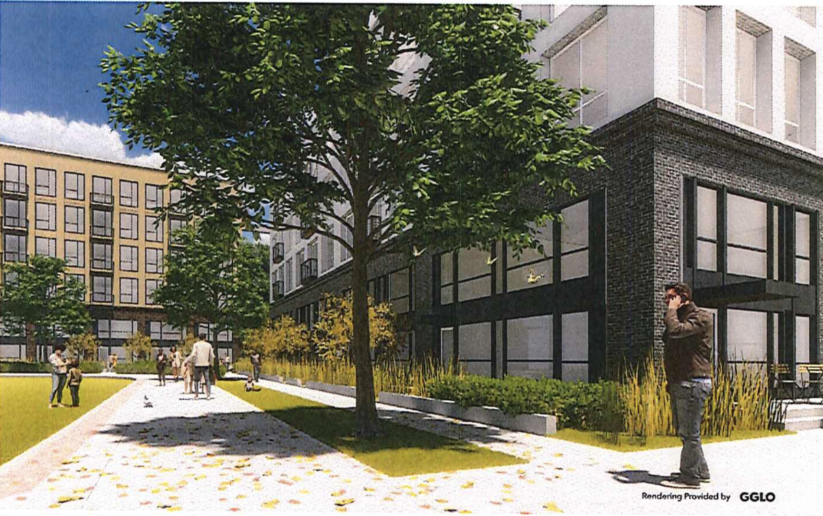 An artist’s rendering shows the ground-level living units surrounded by native landscaping, meant to compliment Indian Creek.