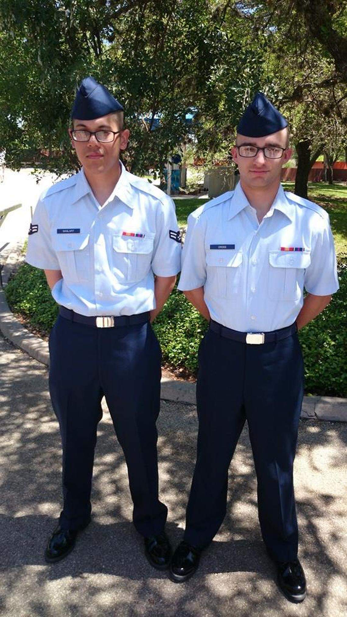 Senior Airman Lawrence P. Manlapit III, left