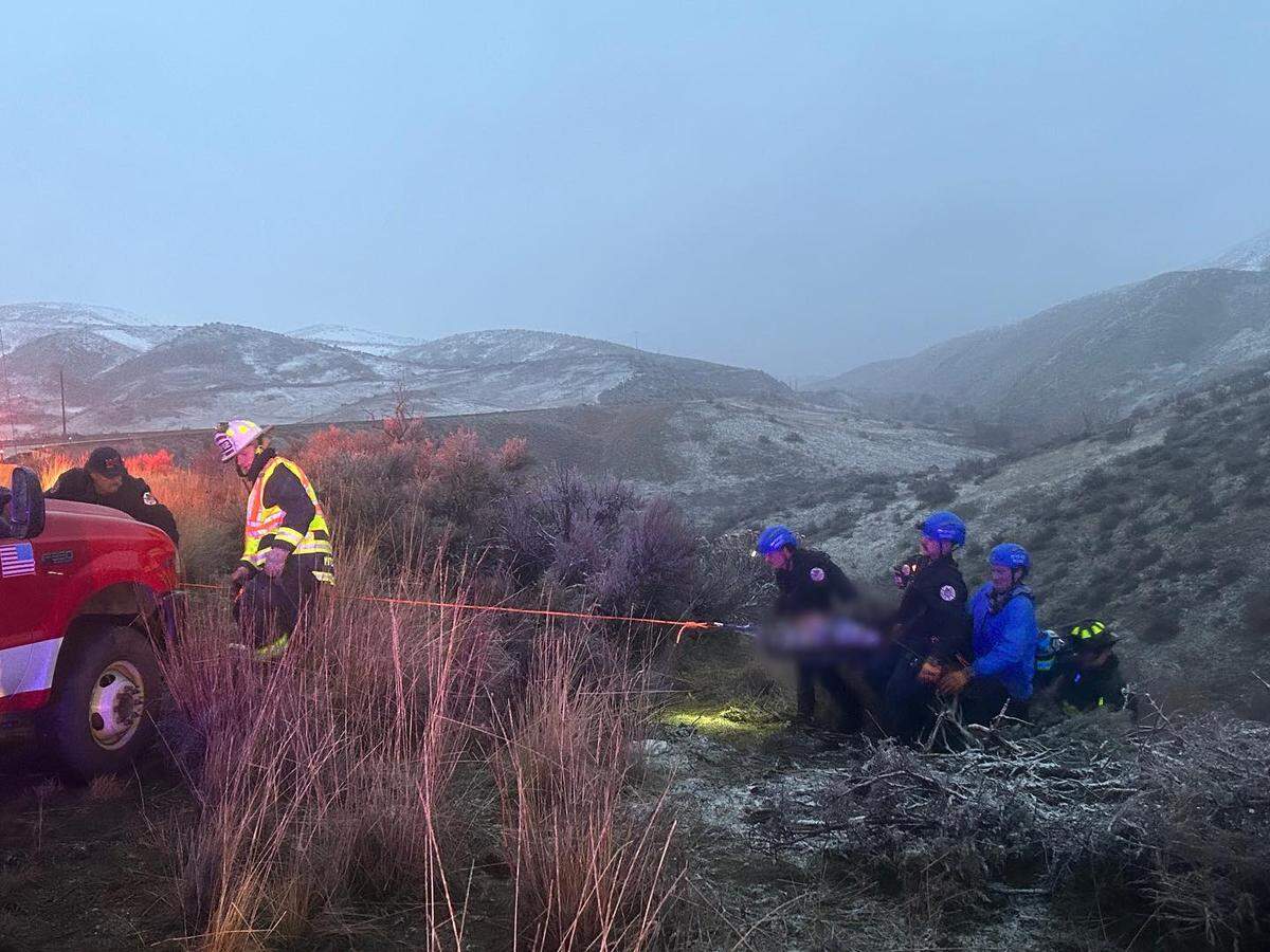 Rescuers brought one person to safety after she fell 150 feet down an embankment.