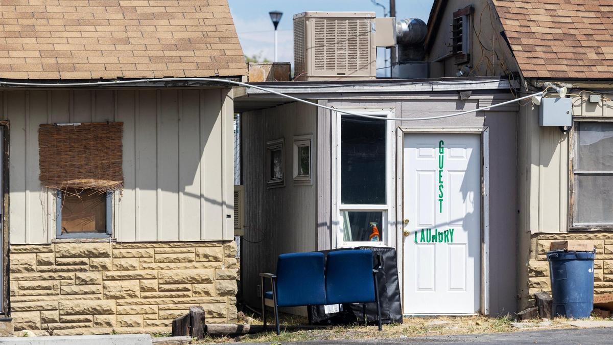 The door to the laundry room of the Travelers Motel. A building inspector said in a report that it appears to be an addition built without permits.