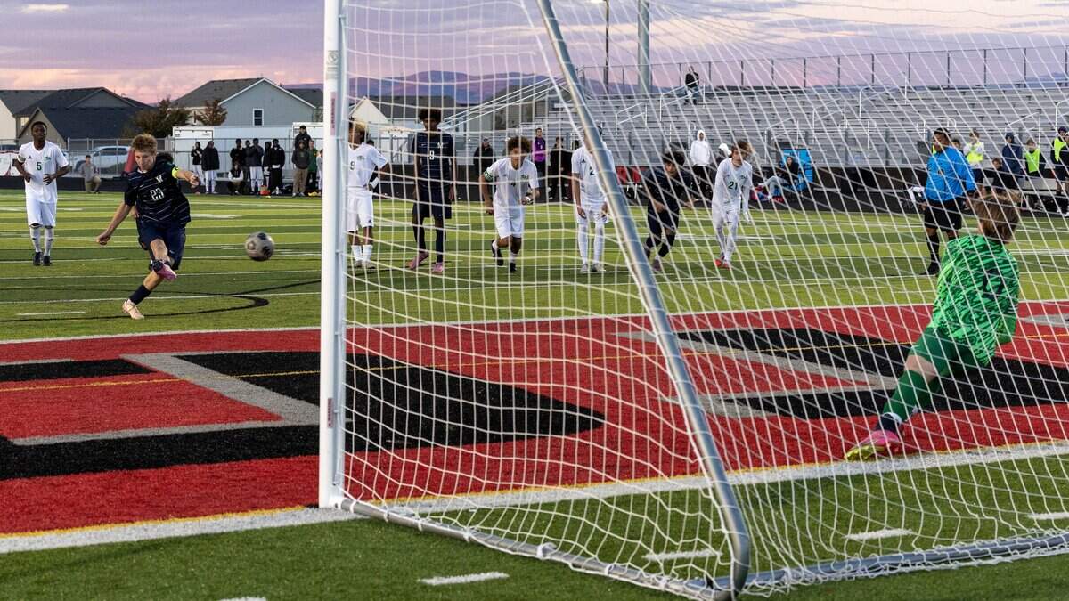 Mountain View senior Jace Obenchain scores the Mavericks' second goal on a penalty kick defended by Borah goalkeeper Christian Griffith in the 6A District Three boys soccer tournament semifinals at Owyhee High School in Meridian, Monday, Oct. 13, 2025.