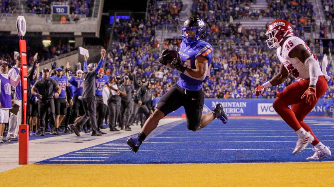 Boise State running back George Holani scores a touchdown in the third quarter of the Broncos’ 40-20 win over Fresno State on Saturday night at Albertsons Stadium.