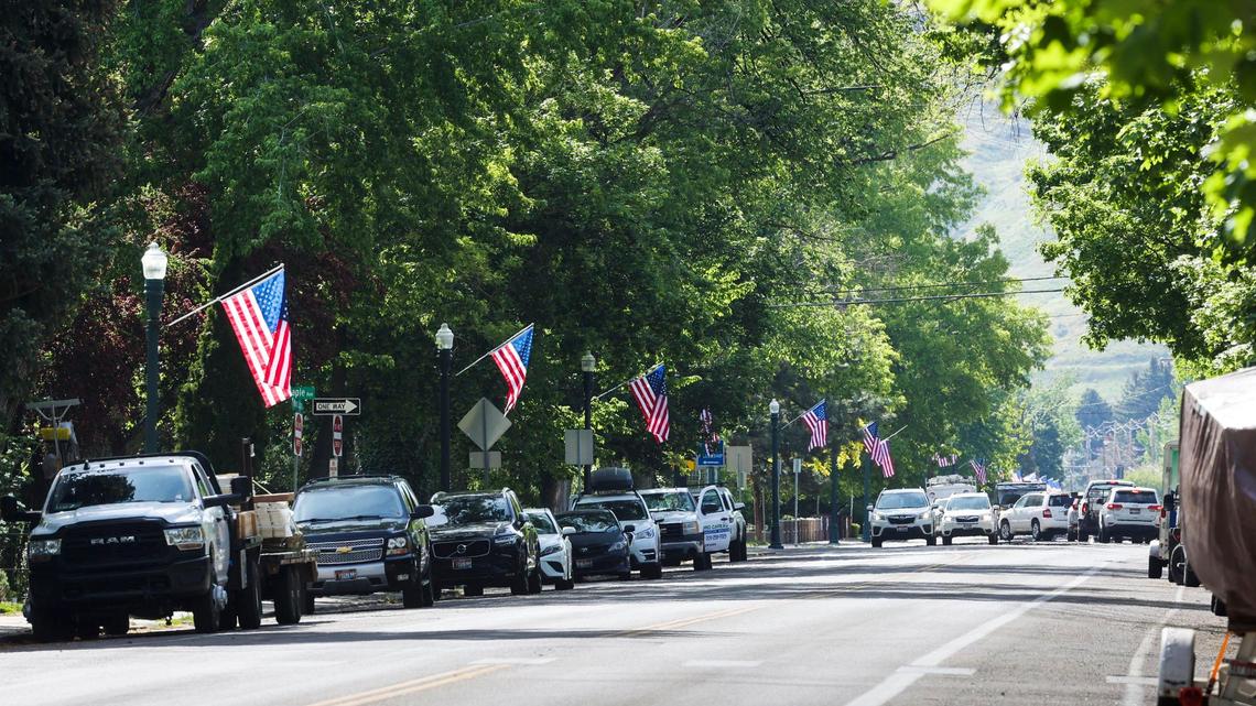 Homeowners on one of Boise’s historic streets donate money to hang Memorial Day flags