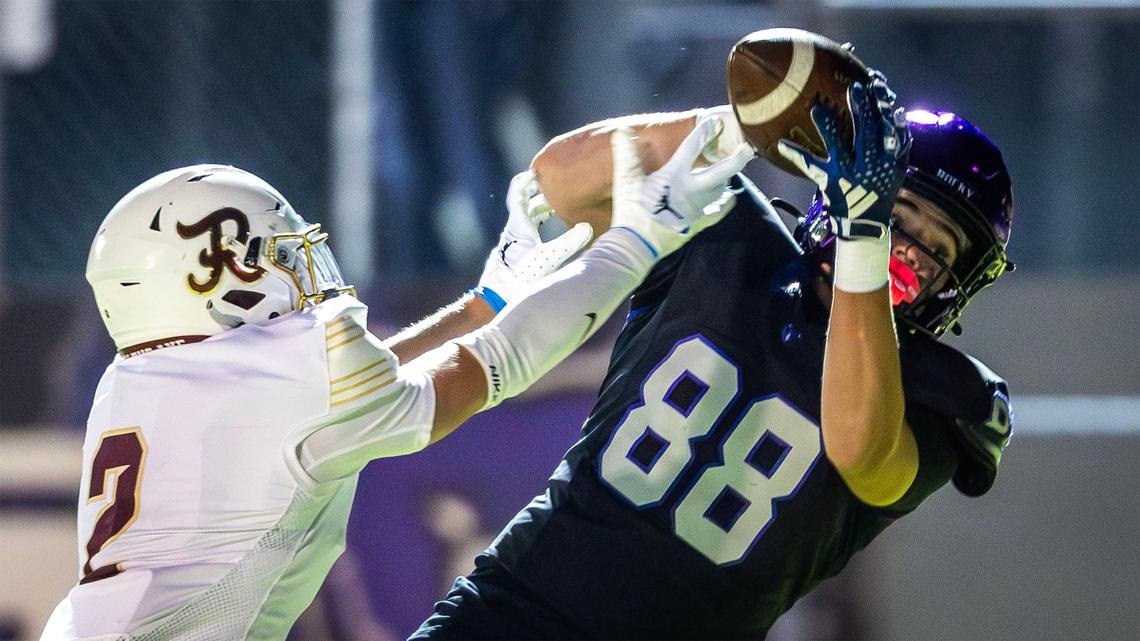 Rocky Mountain’s Drew Byrd hauls in a 32-yard catch against Rigby in last year’s state semifinals. The Washington State commit is one of four FBS commits for the Grizzlies entering the season. 