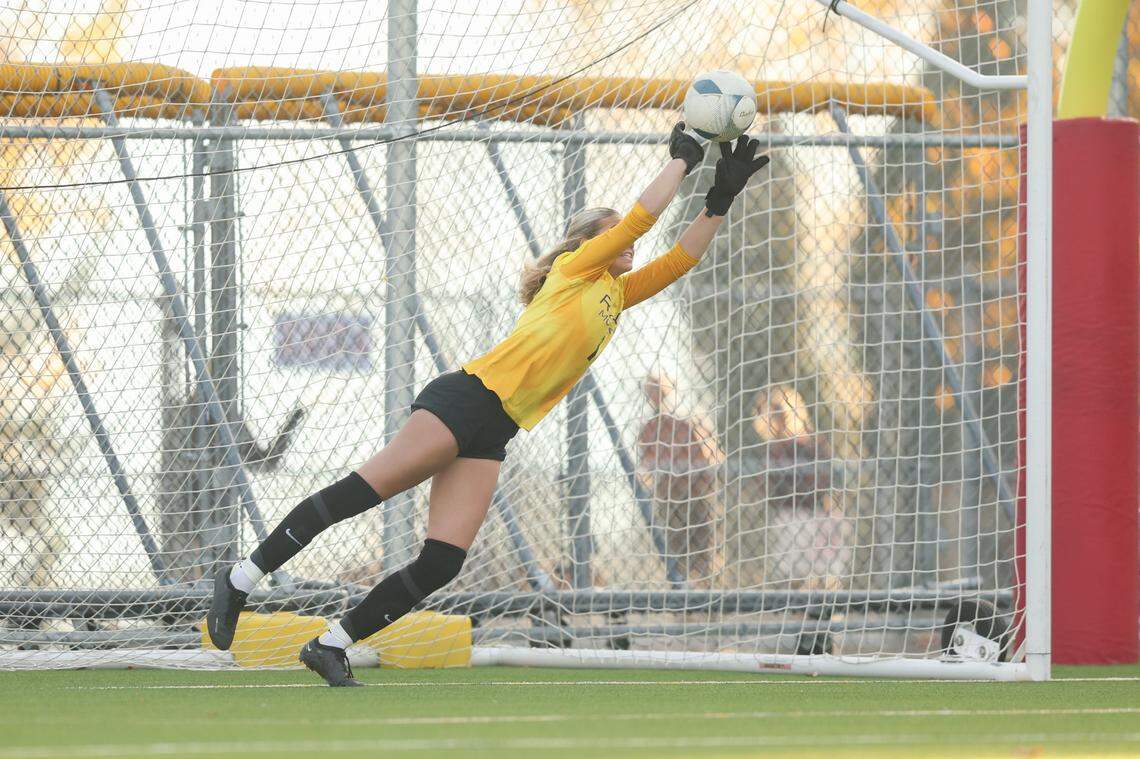 Rocky Mountain’s Bea Levi makes the decisive save during the penalty-kick shootout in the Idaho 6A girls soccer state championship Saturday at War Memorial Field in Sandpoint. Rocky Mountain beat Boise 5-4 in the shootout after a 0-0 draw.