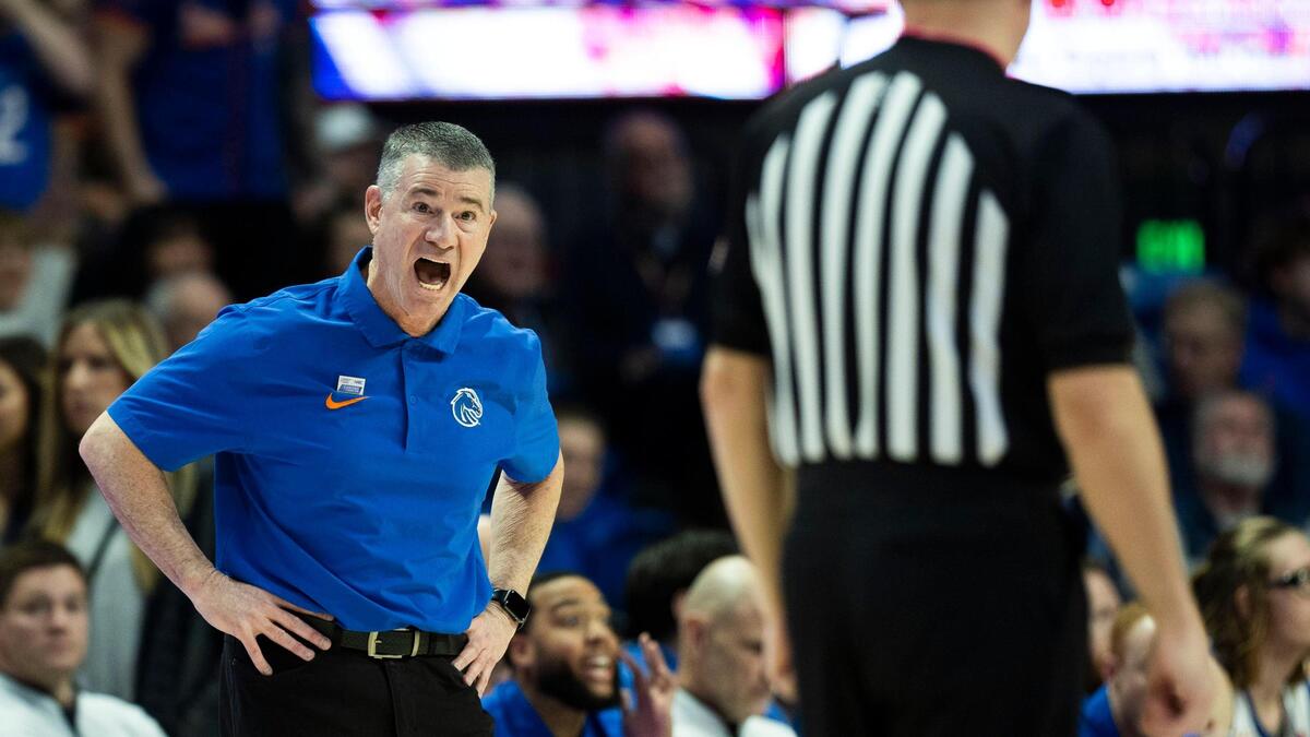 Boise State coach Leon Rice screams at an official in the first half against Utah State at ExtraMile Arena on Saturday. The Broncos lost to the Aggies in overtime.