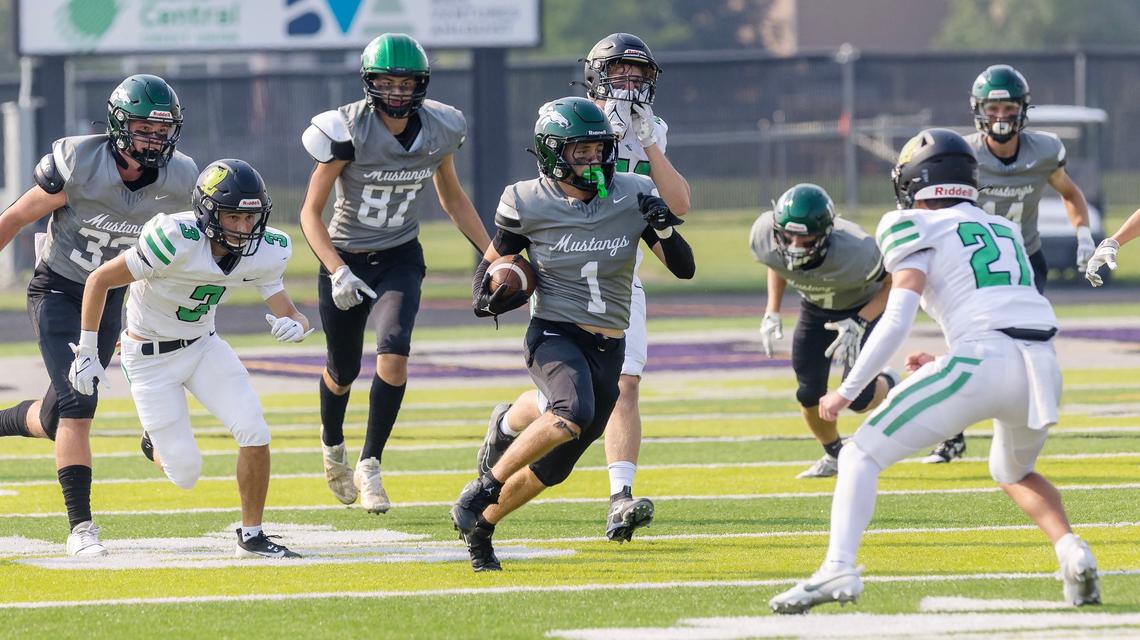 Eagle defensive back Aaron Zrno returns a kickoff against West Linn on Saturday in the Northwest Showdown held at Rocky Mountain High.