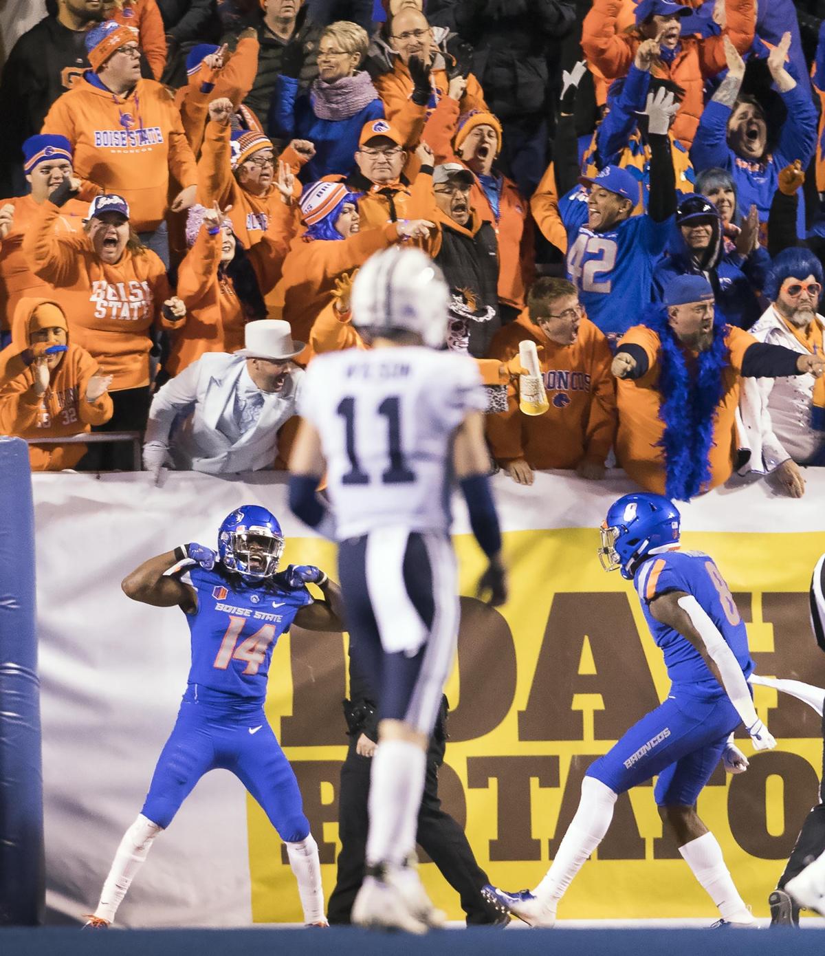 Boise State cornerback Tyler Horton (14) flexes after forcing a BYU turnover at the five yard line Saturday Nov. 3, 2018 at Albertsons Stadium in Boise.