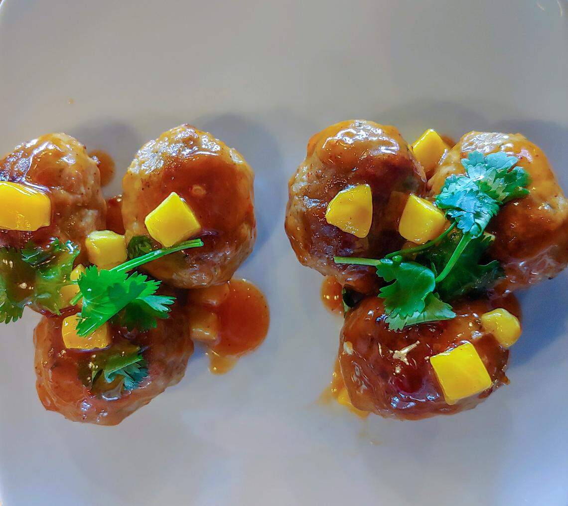 Buffalo Balls ($7.95 six-piece/$13.95 dozen): Roasted meatballs with your choice of sauce (buffalo, teriyaki, marinara, Thai peanut, garlic cream, mango habanero).