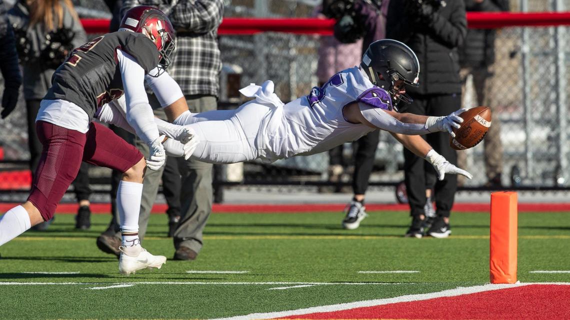 Rocky Mountain running back Arthur Williams dives for the pylon during last year’s 5A state championship game.