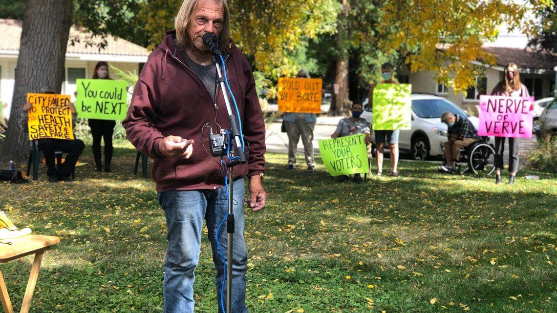 Mike Wallace has lived in the Ridenbaugh Place Apartments for almost 20 years. He spoke Wednesday at a protest involving promised relocation costs from the developer who is razing Ridenbaugh to build luxury apartments..