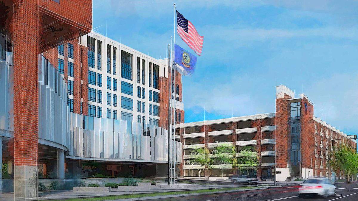 An architect’s view of the new main entry area planned along Fort Street. The entry is at far left. A new medical office plaza over 1st Street is at center left. A recently completed patient parking garage is at right.