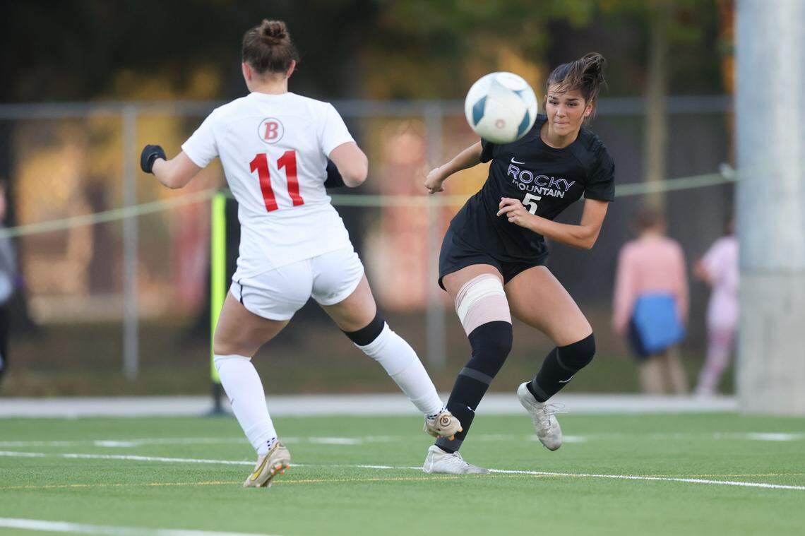 Rocky Mountain’s Andi Hilton fires a shot past Boise’s Emerson Shirey in the second half of the 6A girls soccer championship game Saturday at War Memorial Field in Sandpoint.