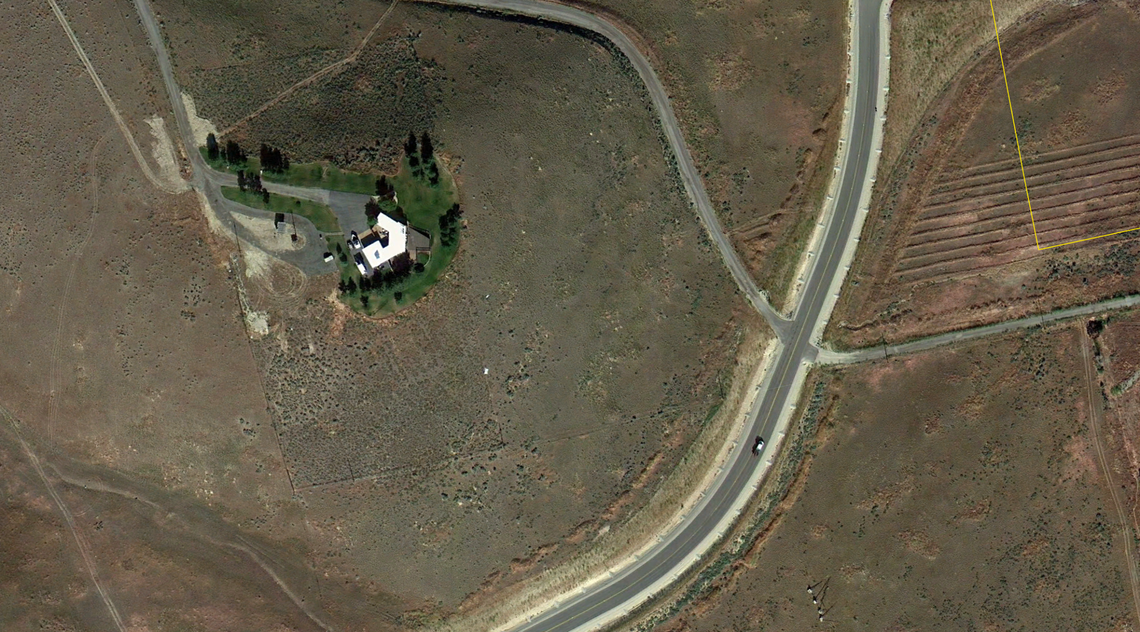 A 2011 Google Earth aerial view of a Boise home shows the message reading IRIS, which was pruned into the sagebrush by a former homeowner selling flowers, nearly overgrown almost a decade after it appeared.