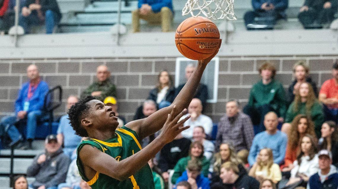 Borah senior Yohanes Mina finished with 15 points and 13 rebounds for the Lions on Tuesday.