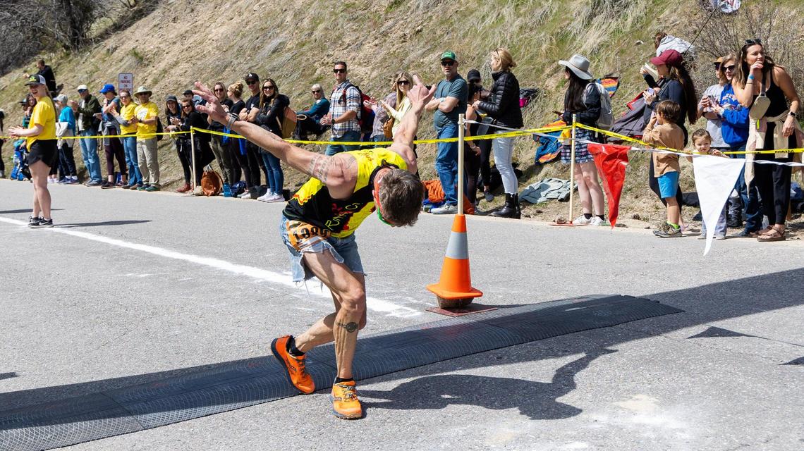 Brian Baker takes a bow at the Race to Robie Creek finish line.