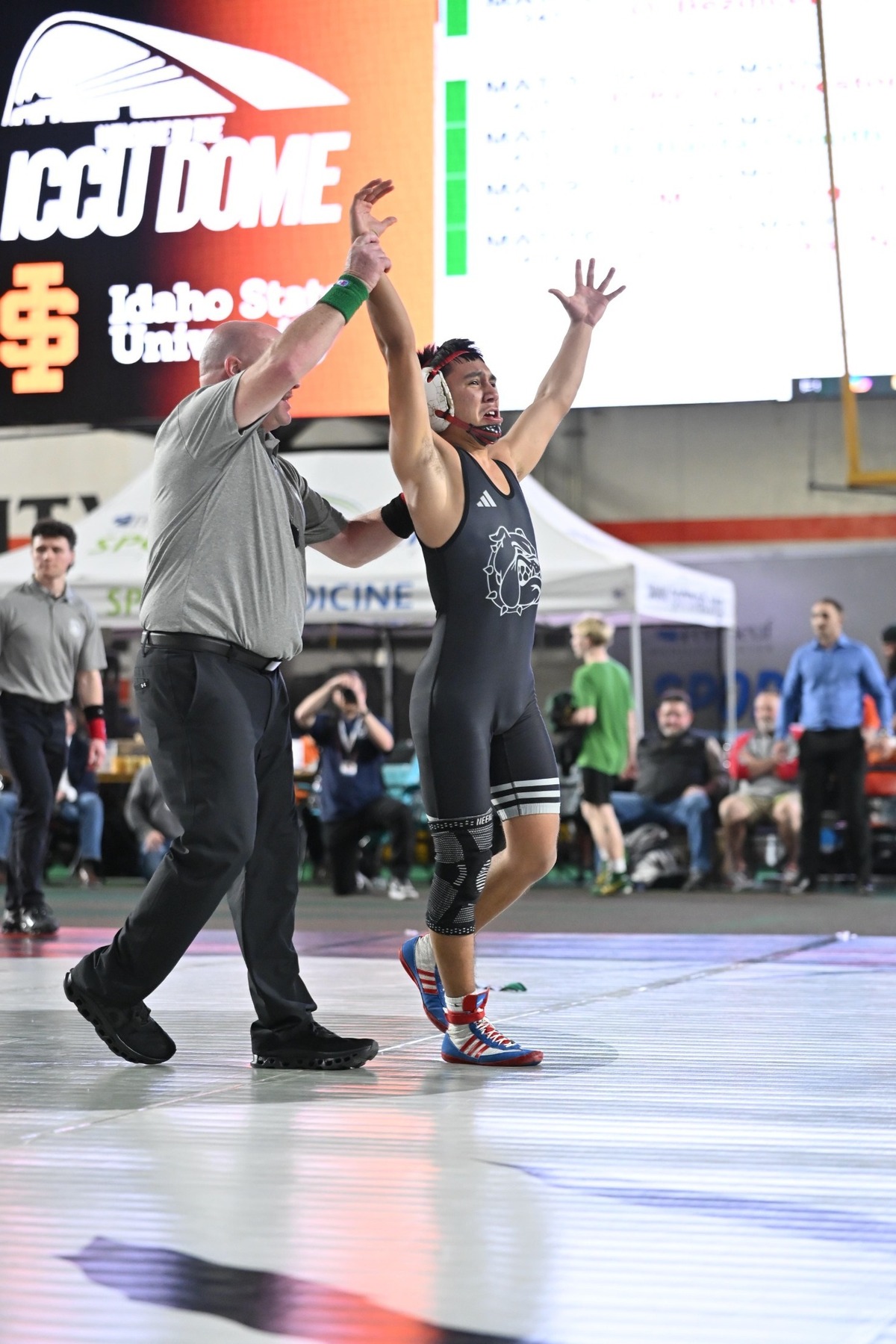 Nampa’s Vincent Contreras celebrates his third straight state championship last year in Pocatello.
