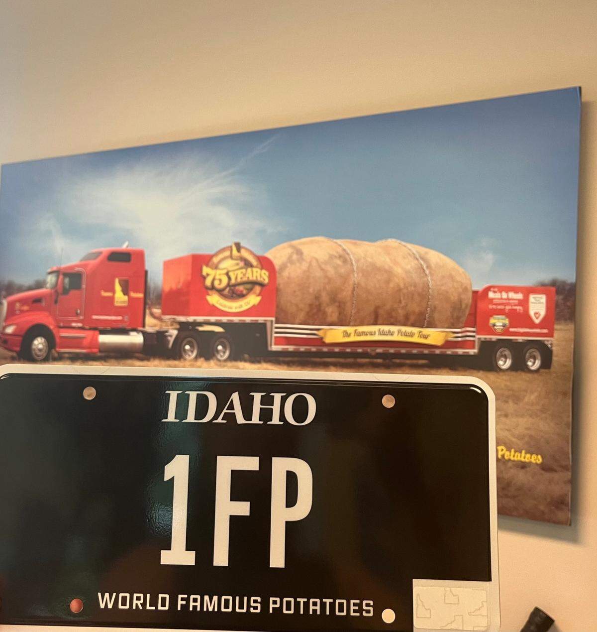 Some proceeds from the black “World Famous Potatoes” license plate will assist the Idaho Potato Commission, which uses the Big Idaho Potato Truck for promotional tours.