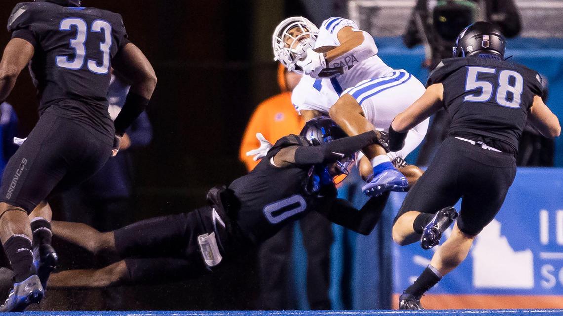 Boise State safety JL Skinner stops BYU running back Hinckley Ropati in the red zone during the Broncos’ 31-28 loss to BYU last November.