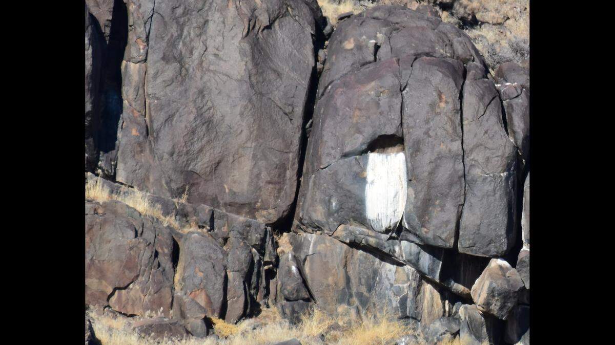 A “poorly painted” rock discovered in Wyoming’s Pathfinder National Wildlife Refuge is actually covered with bird poop, not paint, U.S. Fish and Wildlife says.