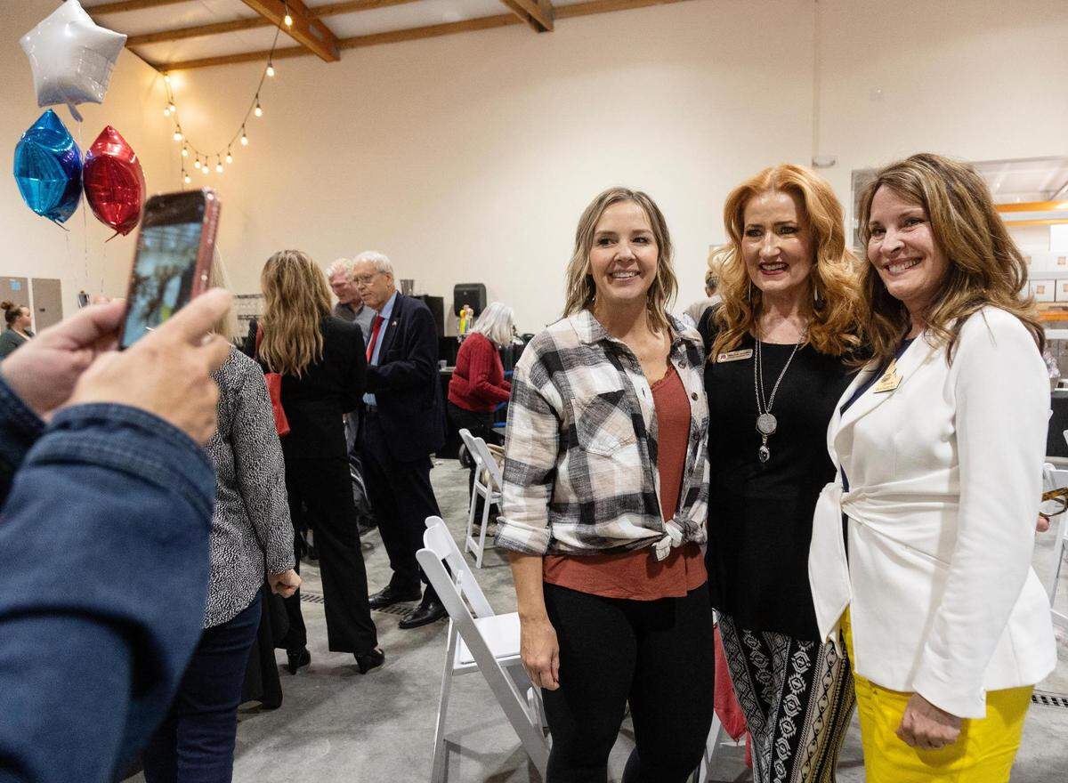 Jennifer Curtiss, of Nampa, left, poses for a photo with Idaho GOP vice chair Machele Hamilton, center, and Lt. Gov. Janice McGeachin at a meet-and-greet campaign fundraiser at a Caldwell-area winery in April.