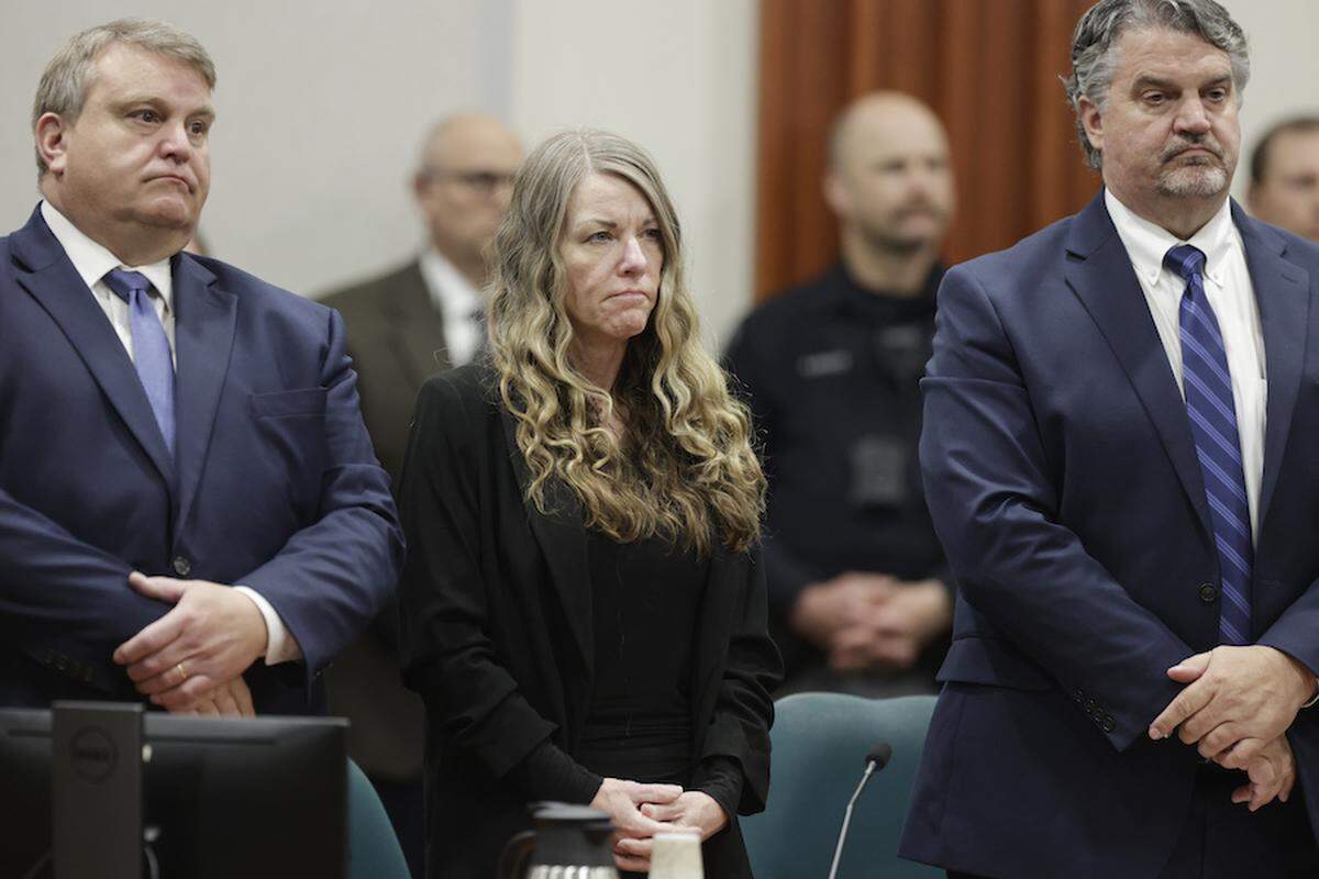 Lori Vallow Daybell stands and listens as the jury’s verdict is read at the Ada County Courthouse in Boise, Idaho on Friday May 12, 2023. The Idaho jury convicted Daybell of the first-degree murders of her two youngest children and Chad Daybell’s then-wife, a verdict that marks the end of a three-year investigation that included bizarre claims of zombie children, apocalyptic prophesies and illicit affairs.